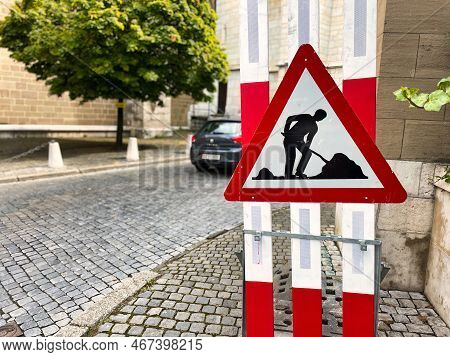 Geneva, Switzerland - September 15 2021: Warning Sign And Light Indicate A Work Or Contruction Zone 