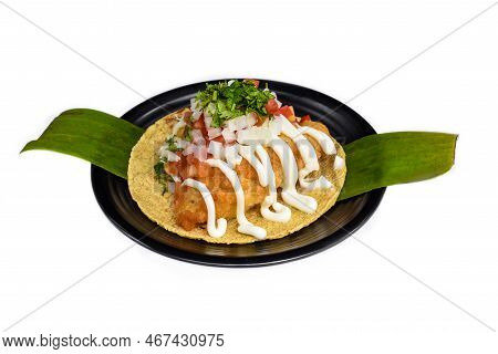 Taco Condesa With Fried Fish On Black Plate Isolated On White Background Site View