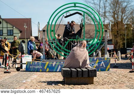 Dobele, Latvia - April 17, 2022: Portable Attractions In The City Square, Aerotrim-human Gyroscope W