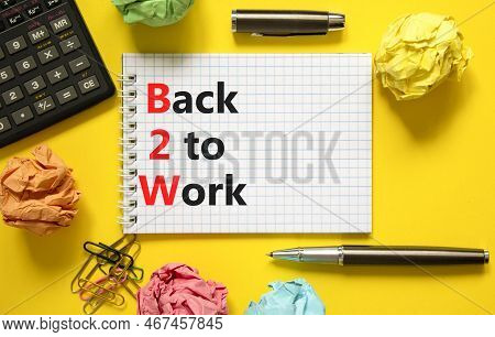 B2w Back To Work Symbol. Concept Words B2w Back To Work On White Note On A Beautiful Yellow Backgrou
