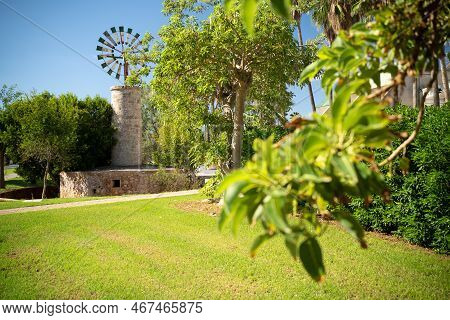 Typical Windmill In Mallorca Used For Pumping Water. Majorcan Typical Architecture Of Wind Mills Dur