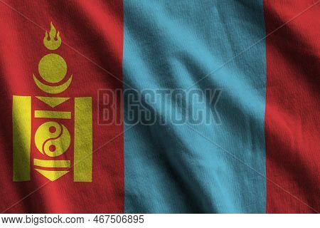 Mongolia Flag With Big Folds Waving Close Up Under The Studio Light Indoors. The Official Symbols An