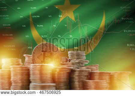 Mauritania Flag And Big Amount Of Golden Bitcoin Coins And Trading Platform Chart. Crypto Currency C
