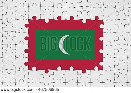 Maldives Flag In Frame Of White Puzzle Pieces With Missing Central Parts