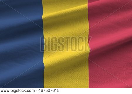 Chad Flag With Big Folds Waving Close Up Under The Studio Light Indoors. The Official Symbols And Co