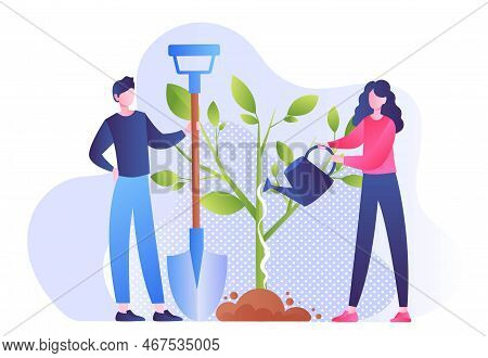 Volunteers Planting Trees. Man And Woman With Shovels Near Plant. Caring For Nature And Ecology, Res