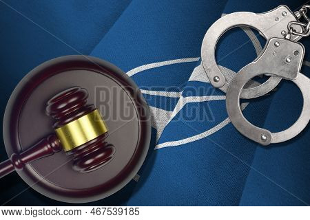 Abkhazia Flag With Judge Mallet And Handcuffs In Dark Room. Concept Of Criminal And Punishment, Back