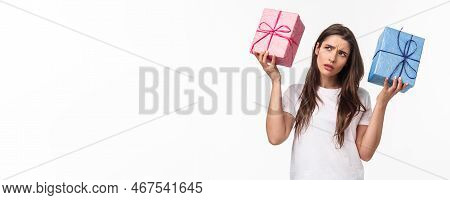 Celebration, Holidays And Presents Concept. Hmmm Interesting What Inside. Portrait Of Curious Young 