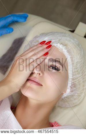 Permanent Make-up For Eyebrows Of Beautiful Woman In Beauty Salon