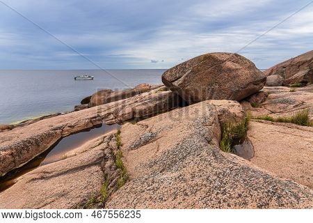 Baltic Sea Coast With Rocks And Ship On The Island Blå Jungfrun In Sweden.