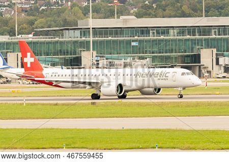Zurich, Switzerland, September 27, 2022 Helvetic Airways Embraer E195-e2 Aircraft Is Taxiing To Its 