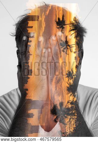 Man With His Hands On His Face Superimposed On A City And A Paradise.anxiety