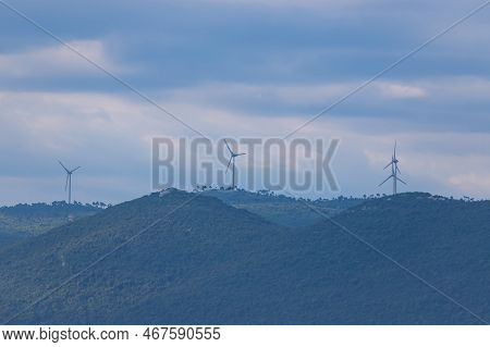 Wind Farm In The Mountains On The Coast In Croatia. View From The City Of Duboka.