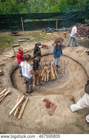 Amarante, Portugal - Circa April 2022: Preparation Of The Bonfire During The Cooking Process Of The 