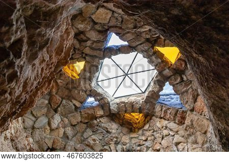 Hararit, Israel, October 28, 2022 : Stained Glass Decorative Window In The Form Of A Six-pointed Sta