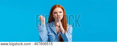 Shut Up Or Else. Angry And Displeased Redhead Girl Threaten Roommate Be Quiet And Shaking Fist, Warn