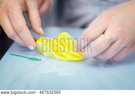 Close Up.the Chef Makes A Decoration Of Orange Slices