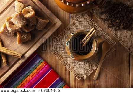 Authentic Homemade Mexican Coffee (cafe De Olla) Served In Traditional Handmade Clay Mug (jarrito De