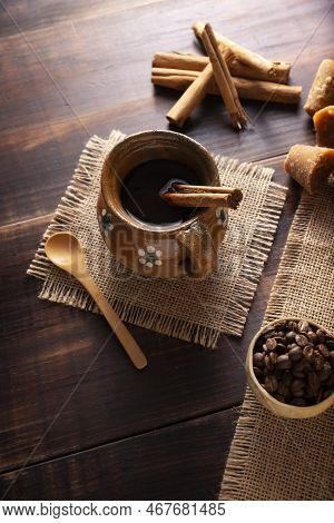 Authentic Homemade Mexican Coffee (cafe De Olla) Served In Traditional Handmade Clay Mug (jarrito De