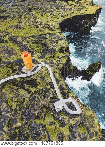 Vertical Photo Of Bright Orange Svortuloft Lighthouse On Snaefellsnes Peninsula, Iceland