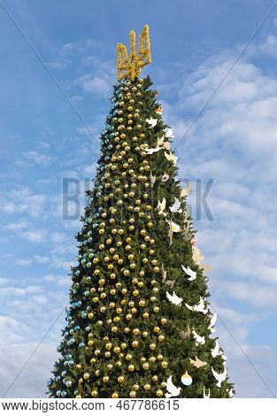 Kyiv, Ukraine - Dec. 22, 2022: The Christmas Tree On Sofiyivska Square Is Being Decorated With Blue 
