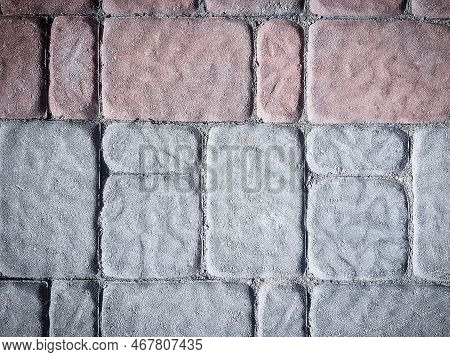 Close-up . A Fragment Of A Red-white Pavement Pavement