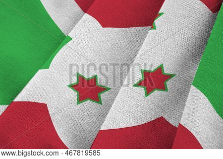 Burundi Flag With Big Folds Waving Close Up Under The Studio Light Indoors. The Official Symbols And