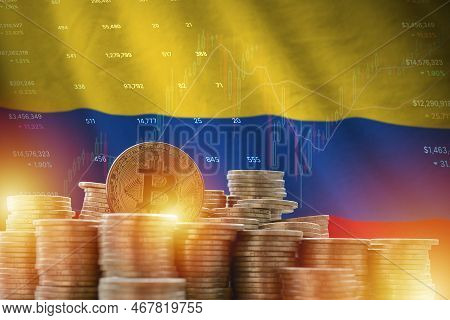 Colombia Flag And Big Amount Of Golden Bitcoin Coins And Trading Platform Chart. Crypto Currency Con