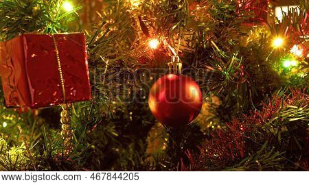 Typical And Traditional Christmas Lights And Decorations On A Christmas Tree Copia