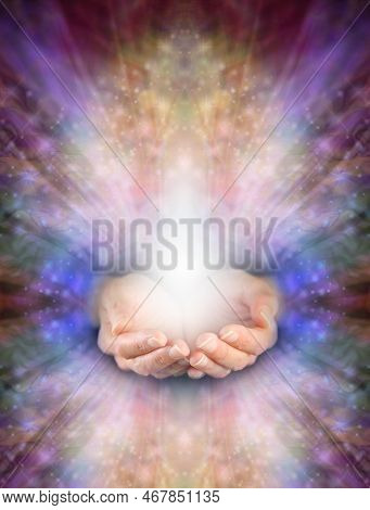 Offering You Beautiful High Resonance Healing Energy - Female Cupped Hands With White Light Against 