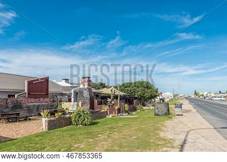 Struisbaai, South Africa - Sep 21, 2022: Street Scene, With A Restaurant, In Struisbaai, In The West