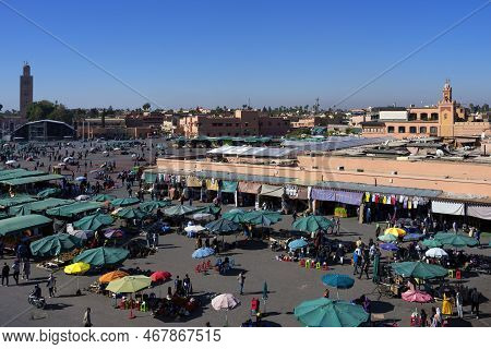 Marrakech, Morocco - December 24, 2022: People Walking In Famous Marrakesh Square Jema El Fna In Mar