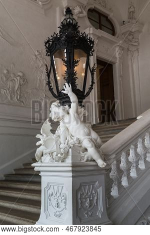 Vianna, Austria - May 16, 2019: This Is A Fragment Of The Main Staircase With A Lamp In The Vestibul