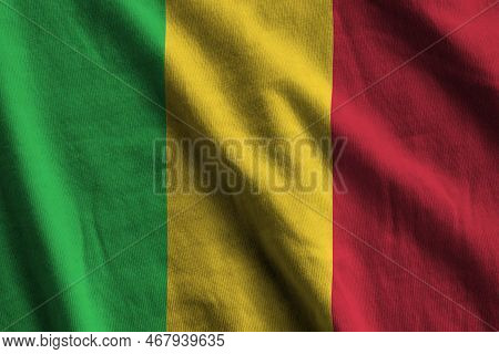 Mali Flag With Big Folds Waving Close Up Under The Studio Light Indoors. The Official Symbols And Co