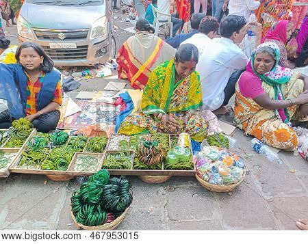 Tuljapur,india- October 28th 2022; Stock Photo Of Indian Women Wearing Saree Sitting On The Street A