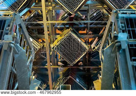 Production Of Cremant Sparkling Wine In Burgundy, France. Automatically Powered Riddling Remuage Box