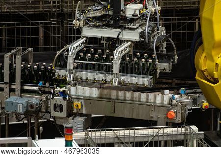 Production Of Cremant Sparkling Wine In Burgundy, France. Automatically Powered Bottling Lines On Fa