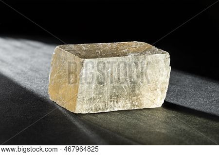 Rhombohedral Form Of Optical Calcite Or Iceland Spare Healing Mineral Raw Stone On Dark Background B