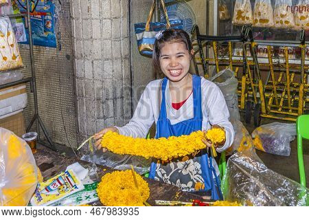 Bangkok, Thailand - May 12, 2009: Unidentified Woman Sells Flowers At The Flower Market Pak Klong Th