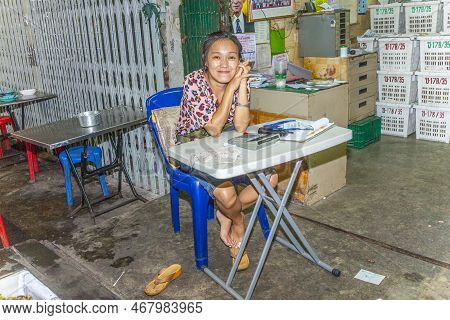 Bangkok, Thailand - May 12: Unidentified Woman Sells Flowers At The Flower Market Pak Klong Thalat E
