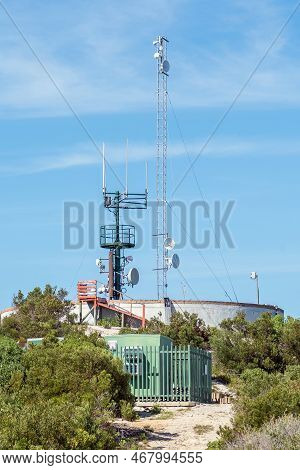 Arniston, South Africa - Sep 22, 2022: A Water Reservoir, Telecommunications Infrastructure And Back