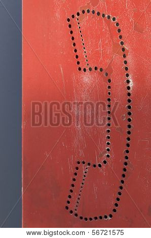 desenho telefone púbico vermelho perfurado