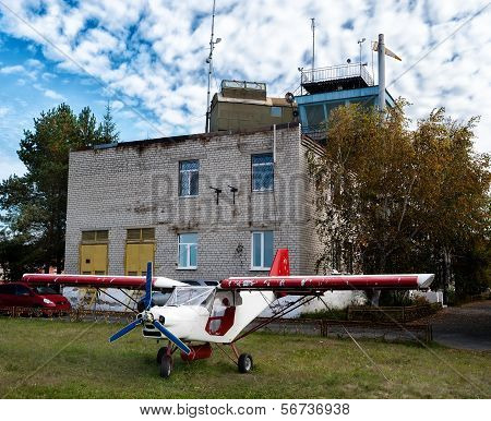 Small airplane in little airport