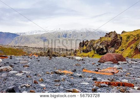 Remains Of A Boat Wreck At The Black Beach On Iceland Snaefellsnes