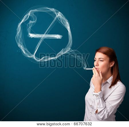 Pretty young lady smoking unheathy cigarette with no smoking sign