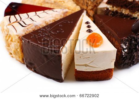 Assortment of pieces of cake, isolated on white