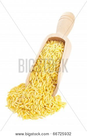 Raw Durum Wheat On Wooden Scoop