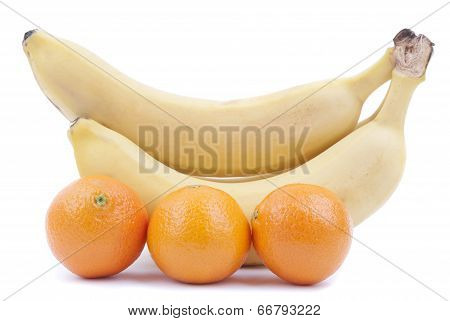 Bananas And Oranges On A White Background.