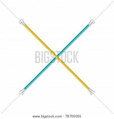 Two crossed twirling batons
