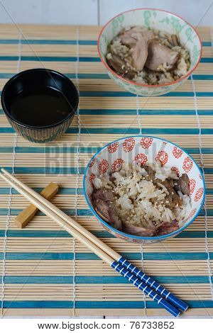 Chinese lunch set with rice and dusck meat, tea